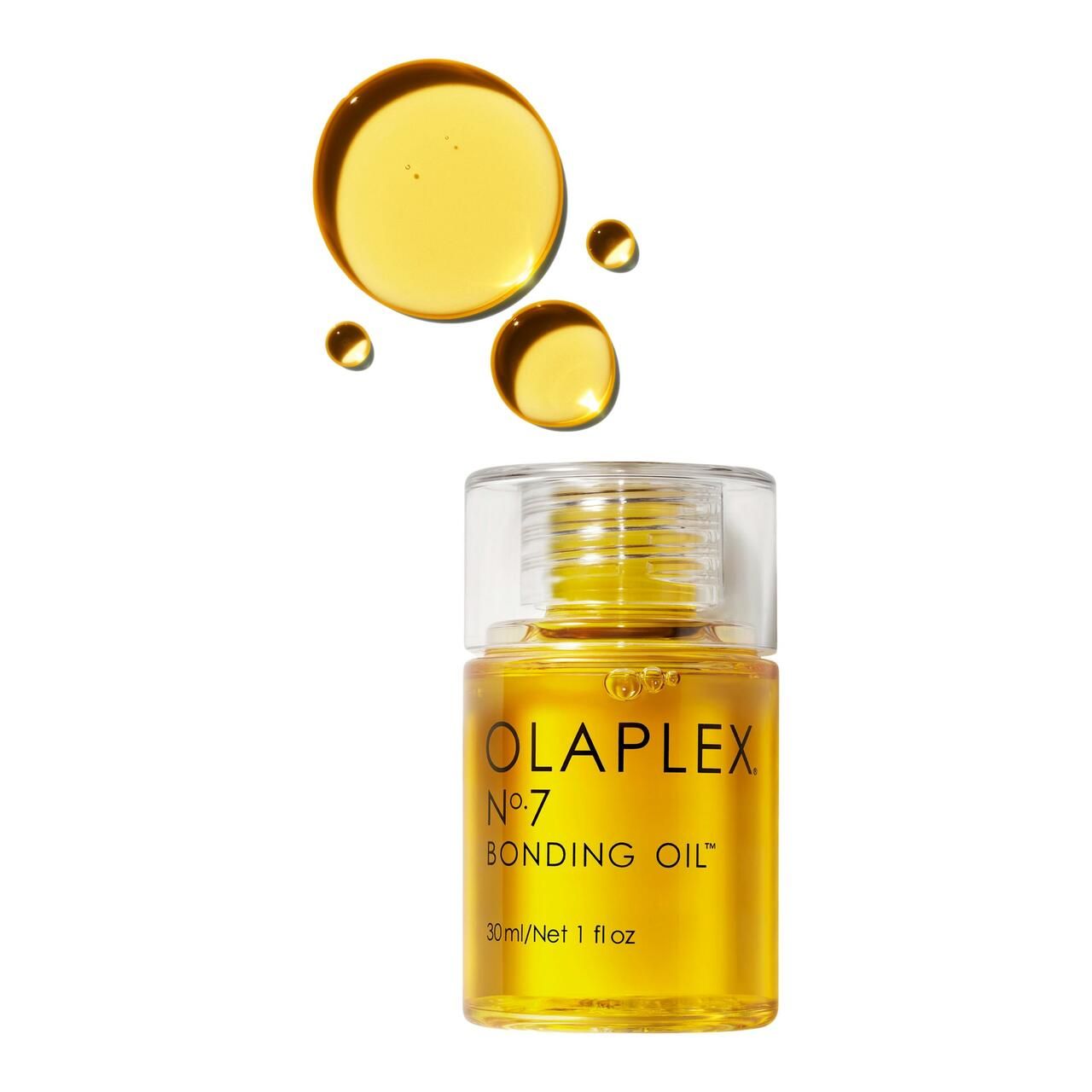 Kleine, gelbe Flasche mit durchsichtigem Deckel. Olaplex No.7 Bonding Oil. 30ml/1 fl oz. Öl-Tropfen.