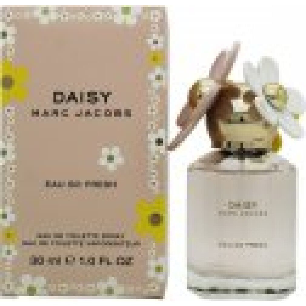 Parfümflakon und Verpackung. Flakon mit Blüten auf dem Deckel. Aufschrift: Daisy Marc Jacobs Eau So Fresh.