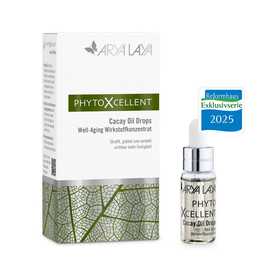 Arya Laya PhytoXcellent Cacay Oil Drops Fläschchen und Faltschachtel mit Blattmuster.
