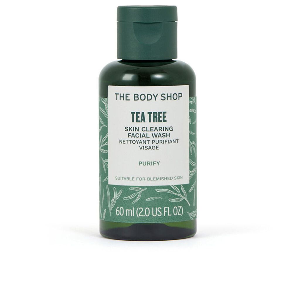 Grüne Flasche mit Klappdeckel. Aufschrift: The Body Shop, Tea Tree, Skin Clearing Facial Wash, 60 ml. Für unreine Haut.