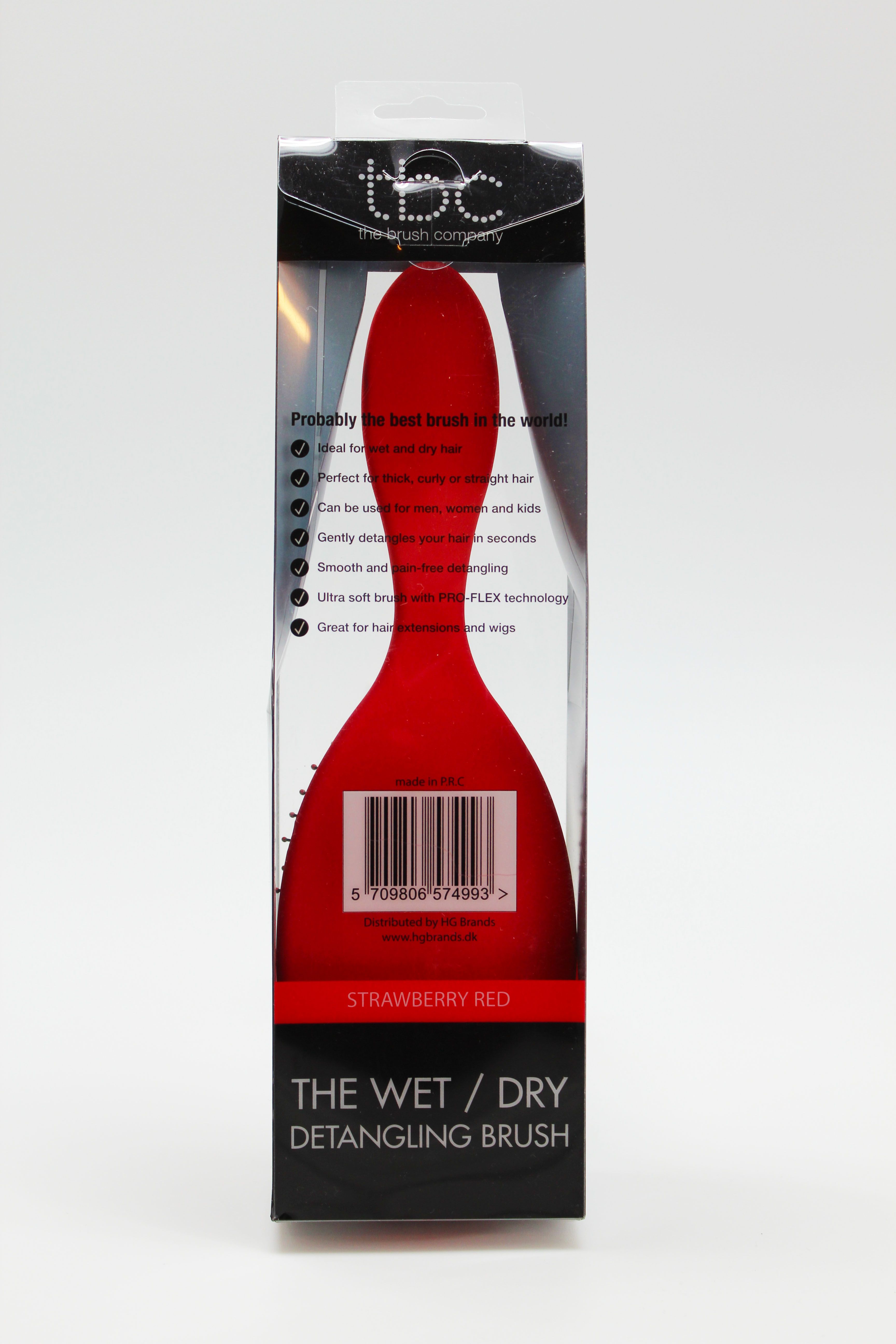 Rückseite der verpackten roten TBC Wet & Dry Haarbürste mit Produktmerkmalen.