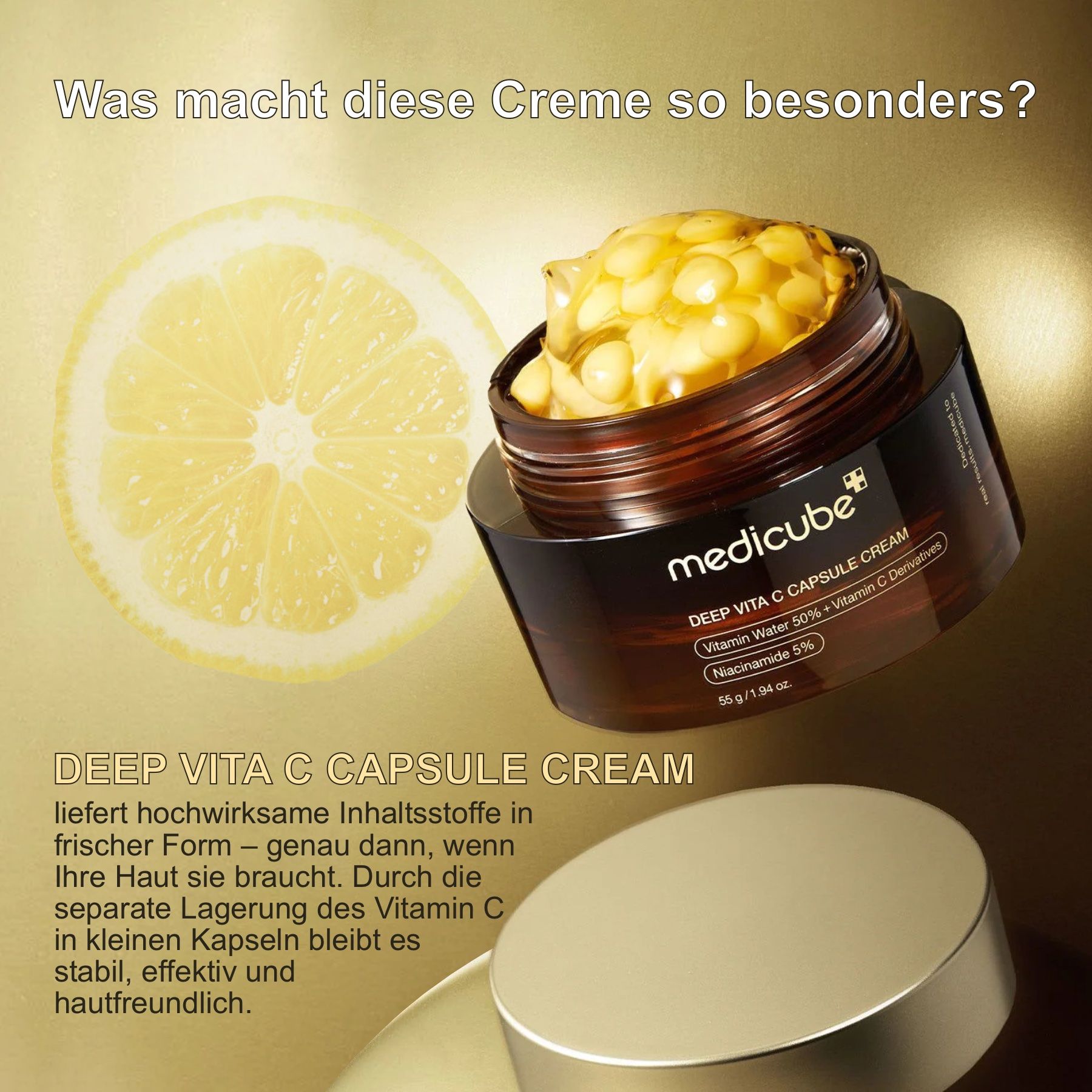 Geöffneter Tiegel mit Creme und gelben Kapseln. Zitrone im Hintergrund. Text: DEEP VITA C CAPSULE CREAM.