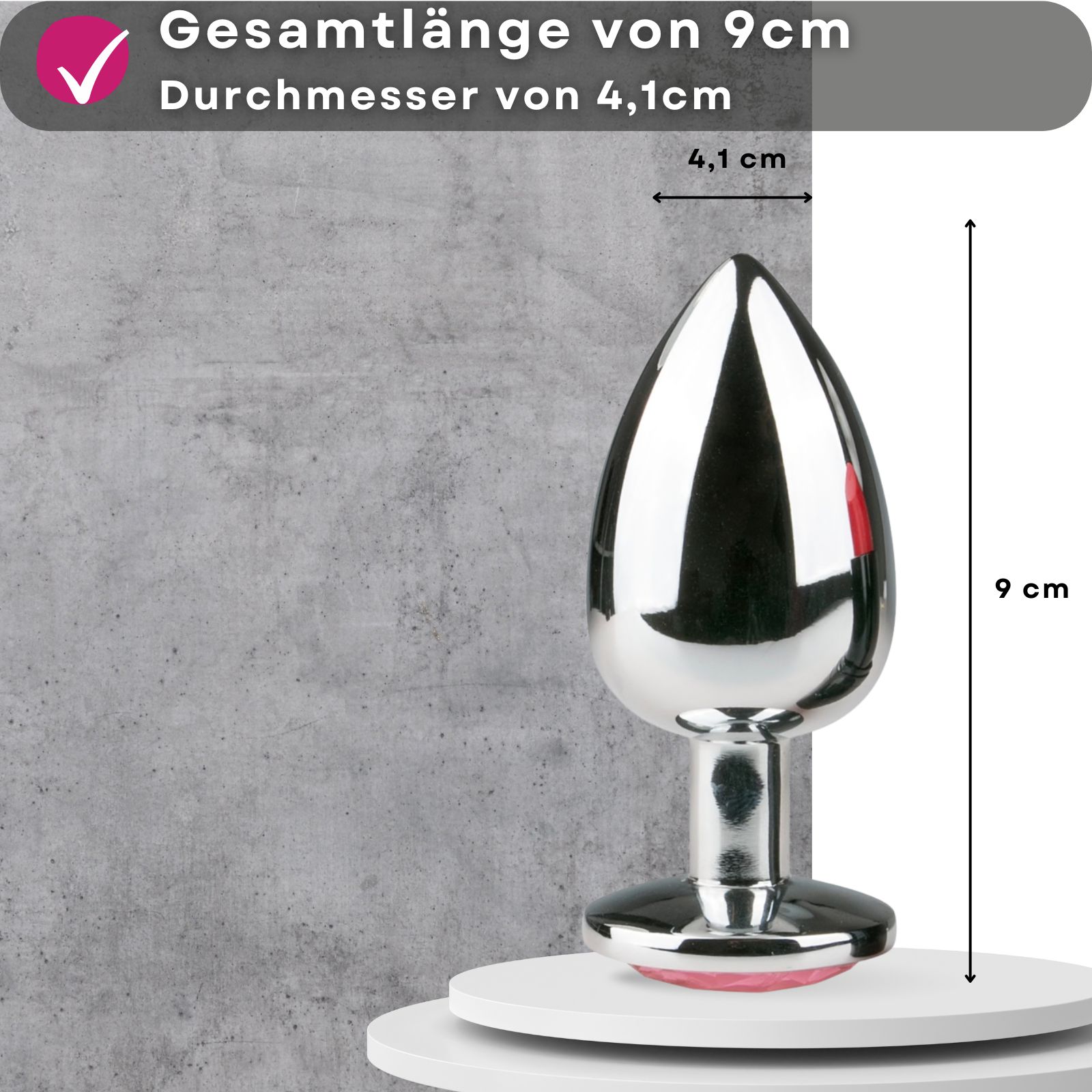 Analplug aus Metall, silberfarben. Text: Gesamtlänge von 9cm, Durchmesser von 4,1cm. Maße.