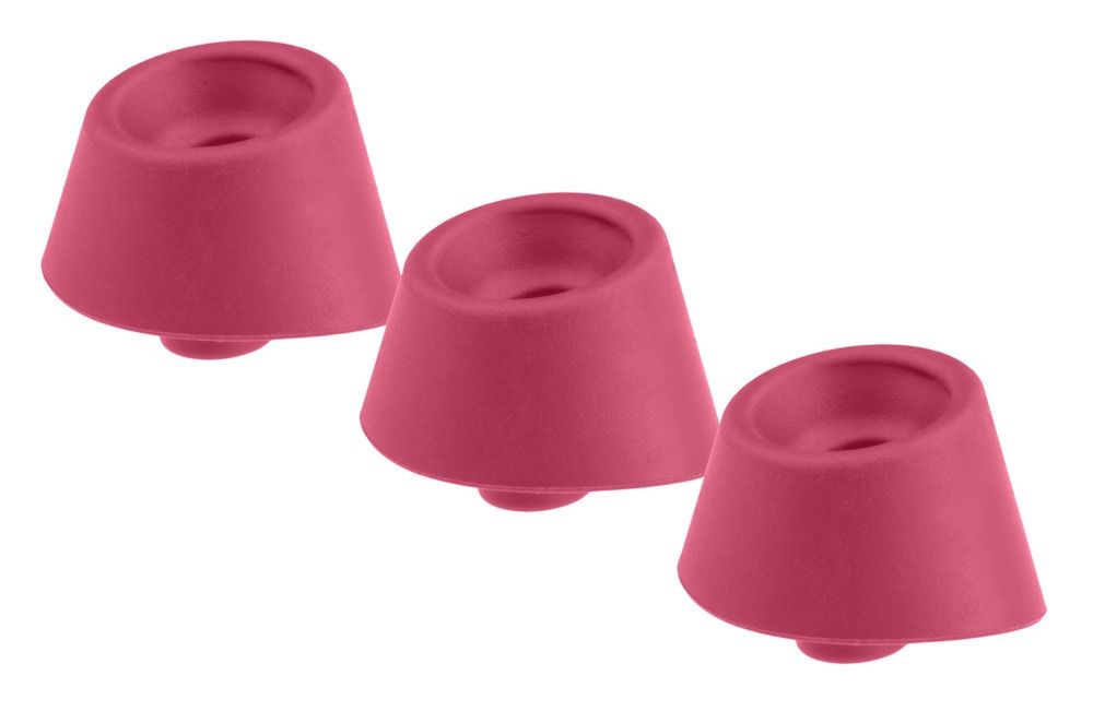 Drei rote Ersatzkappen für ein Wellness-Produkt.