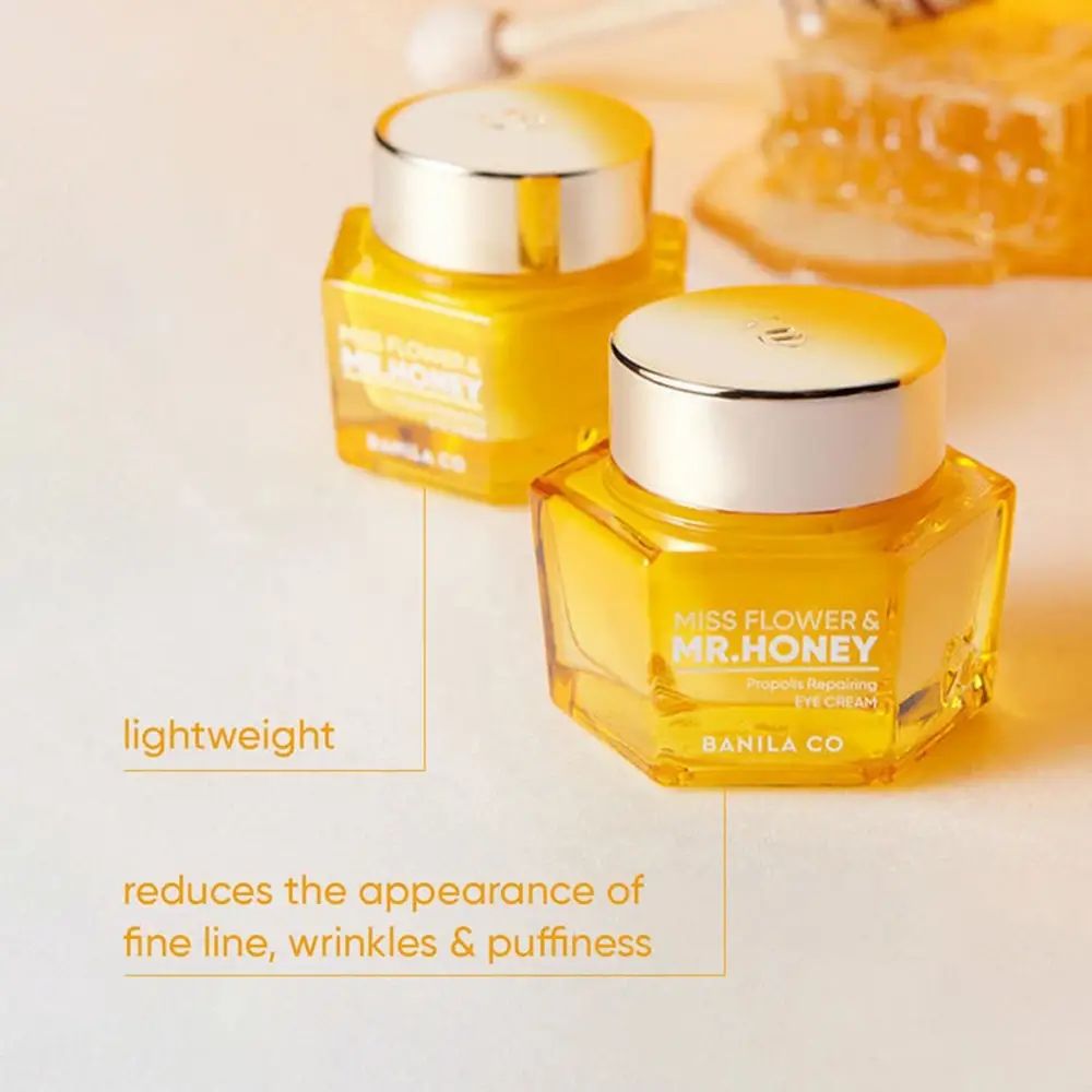 Zwei goldfarbene Augencreme-Tiegel. Aufschrift: Miss Flower & Mr. Honey. Text: Reduziert feine Linien, Falten und Schwellungen.