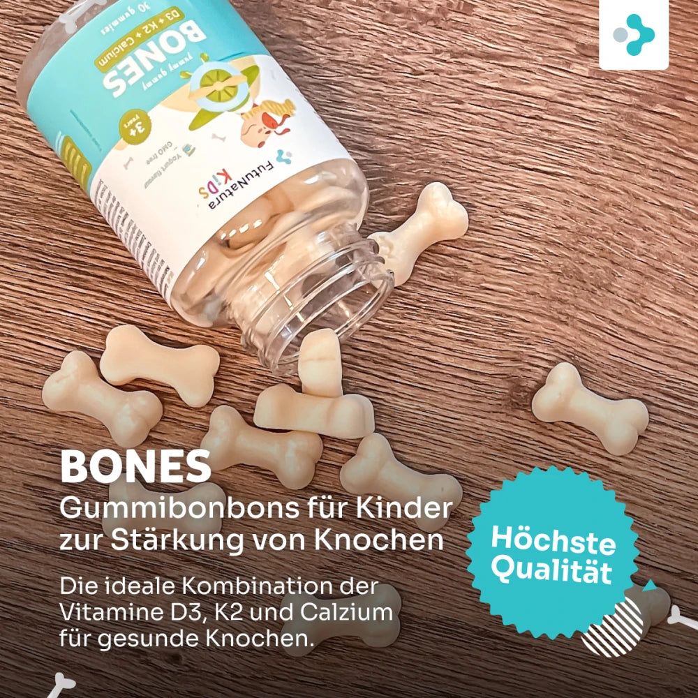 Flasche FutuNatura Bones Gummies und Knochenförmige Gummibärchen auf Holz. Text: Gummibonbons für Kinder zur Stärkung von Knochen.