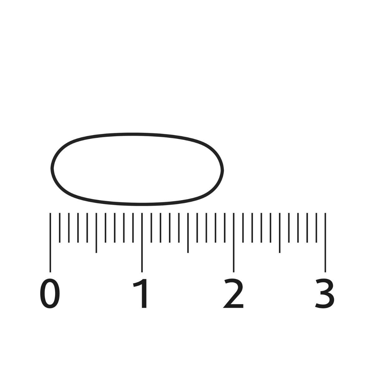 Eine ovale Pille liegt auf einem Lineal, das Zentimeter anzeigt. Die Pille ist etwa 1,5 cm lang.