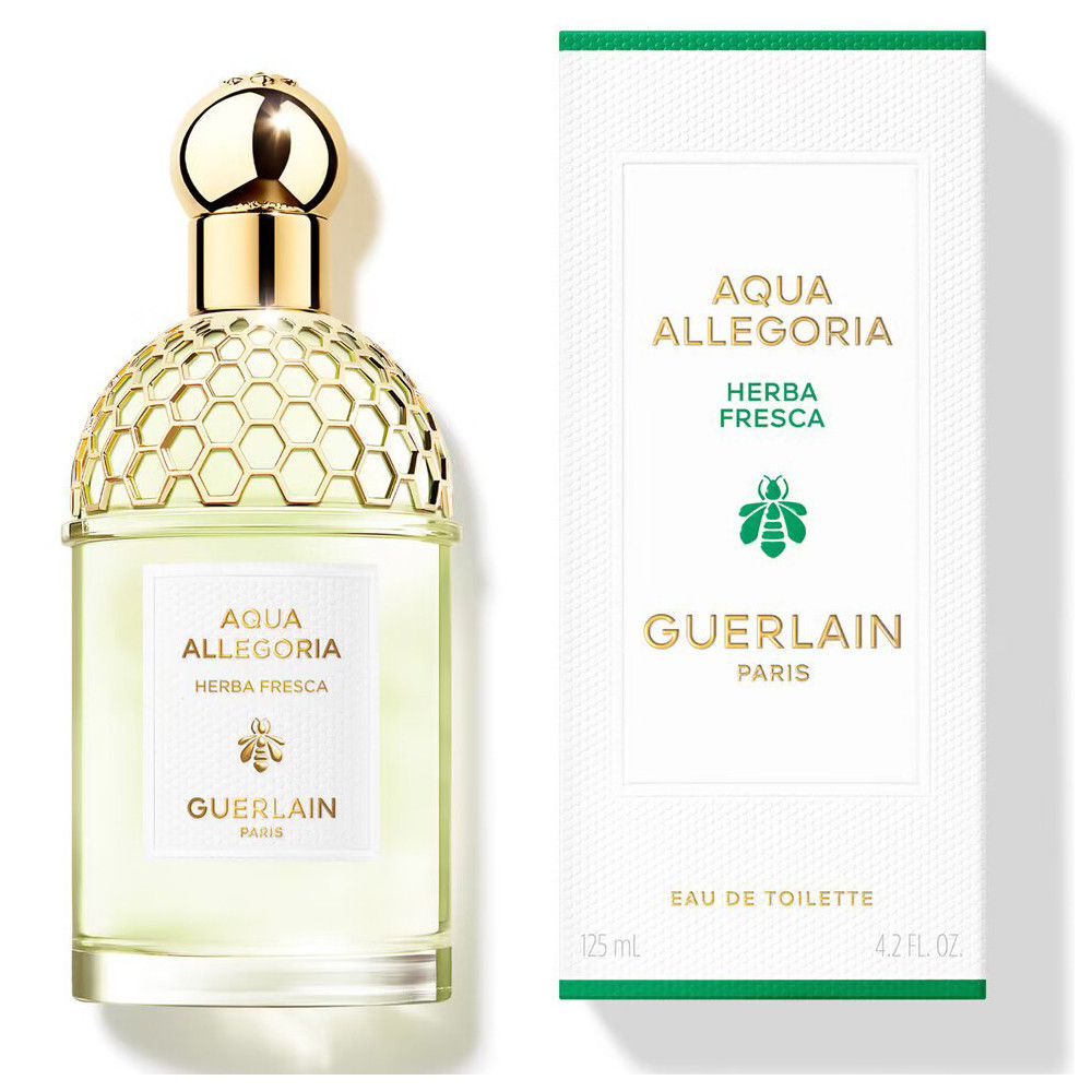 Guerlain Aqua Allegoria Herba Fresca Eau de Toilette Flakon und Verpackung. Flakon mit goldfarbenem Verschluss, Verpackung mit Logo.