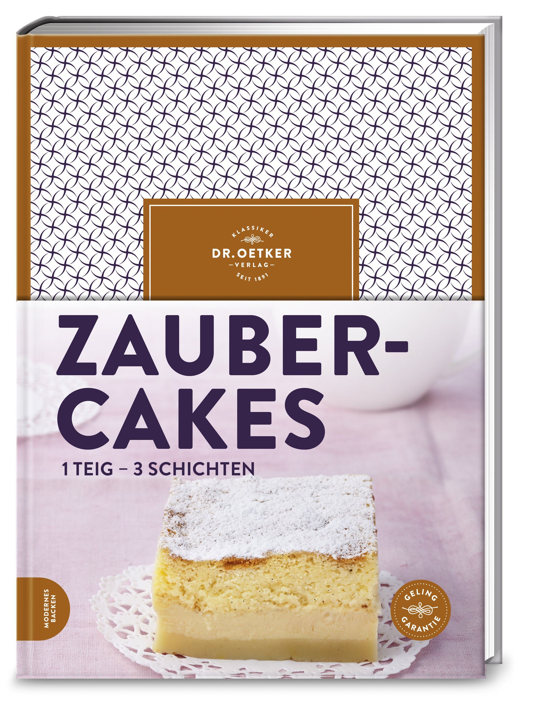 Buchcover mit Titel "Zauber-Cakes". Kuchenstück mit Puderzucker. Logo Dr. Oetker.