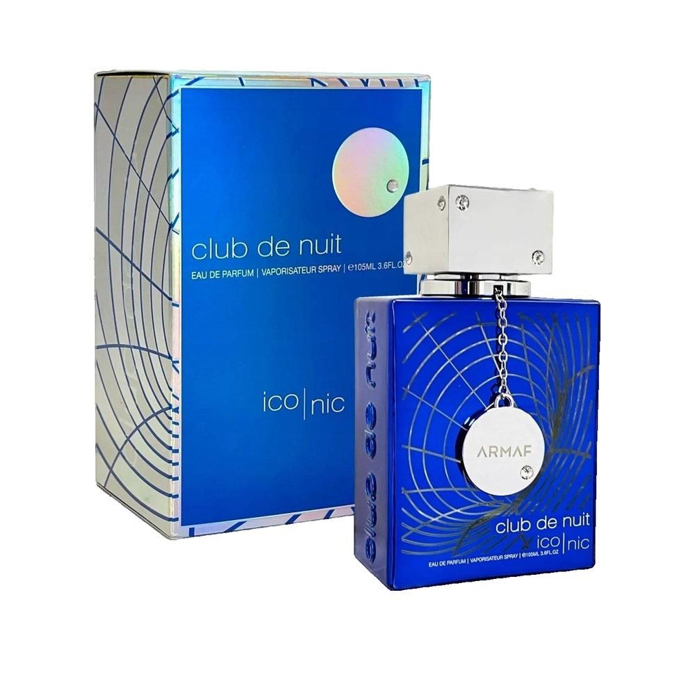 Blauer Flakon und Verpackung. Aufschrift: Club de Nuit Iconic. Silberner Verschluss. Armaf-Logo. Dekorative Linien.