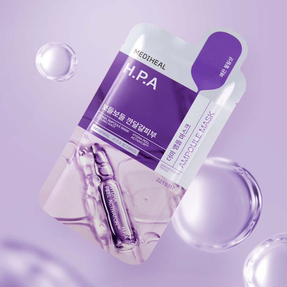 MEDIHEAL Derma Ampoule Tuchmaske H.P.A. Einzelne Maskenverpackung mit Ampulle. Lila und weißes Design, Produktnamen.