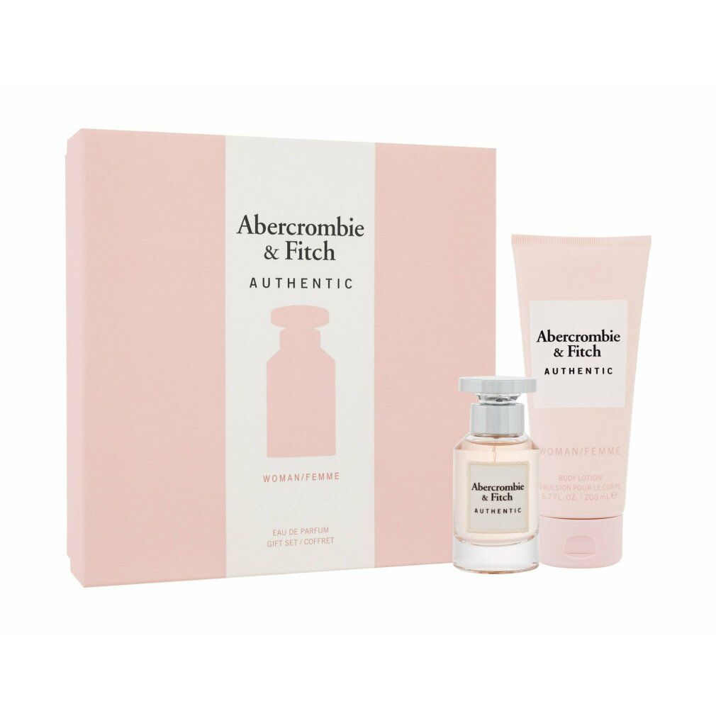 Geschenkset mit Eau de Parfum und Bodylotion. Rosa Verpackung mit Logo und Produktabbildung. Flakon und Tube.