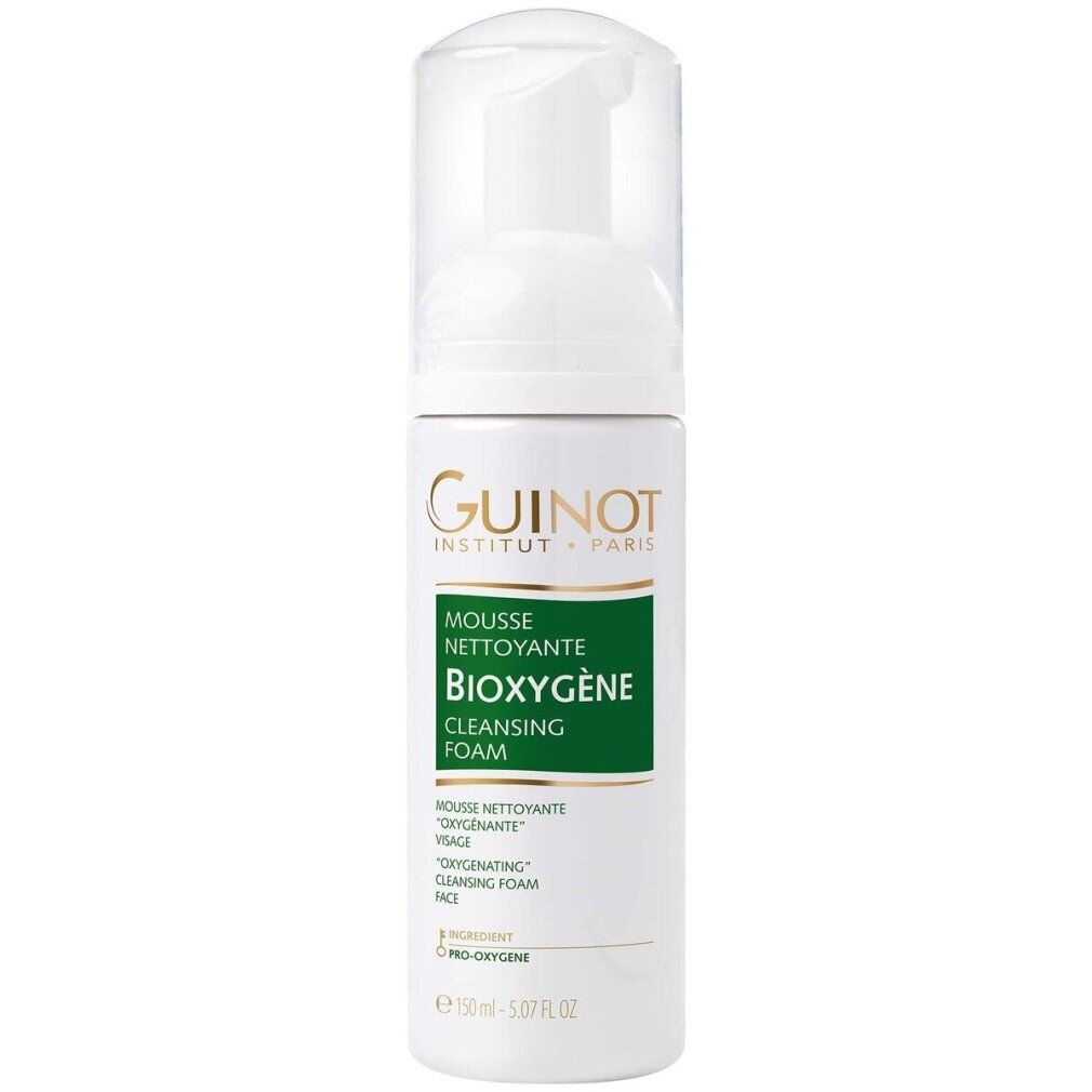 Weißes Fläschchen mit Sprühkopf. Aufschrift: Guinot, Mousse Nettoyante Bioxygene, Cleansing Foam. Grüne und goldene Akzente.