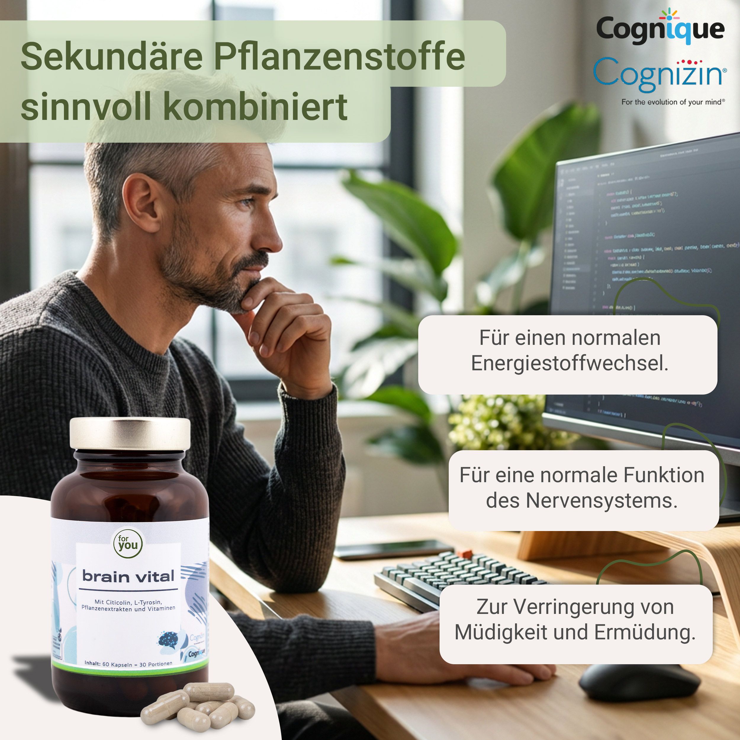 Mann am Schreibtisch mit Brain Vital Flasche und Computer.