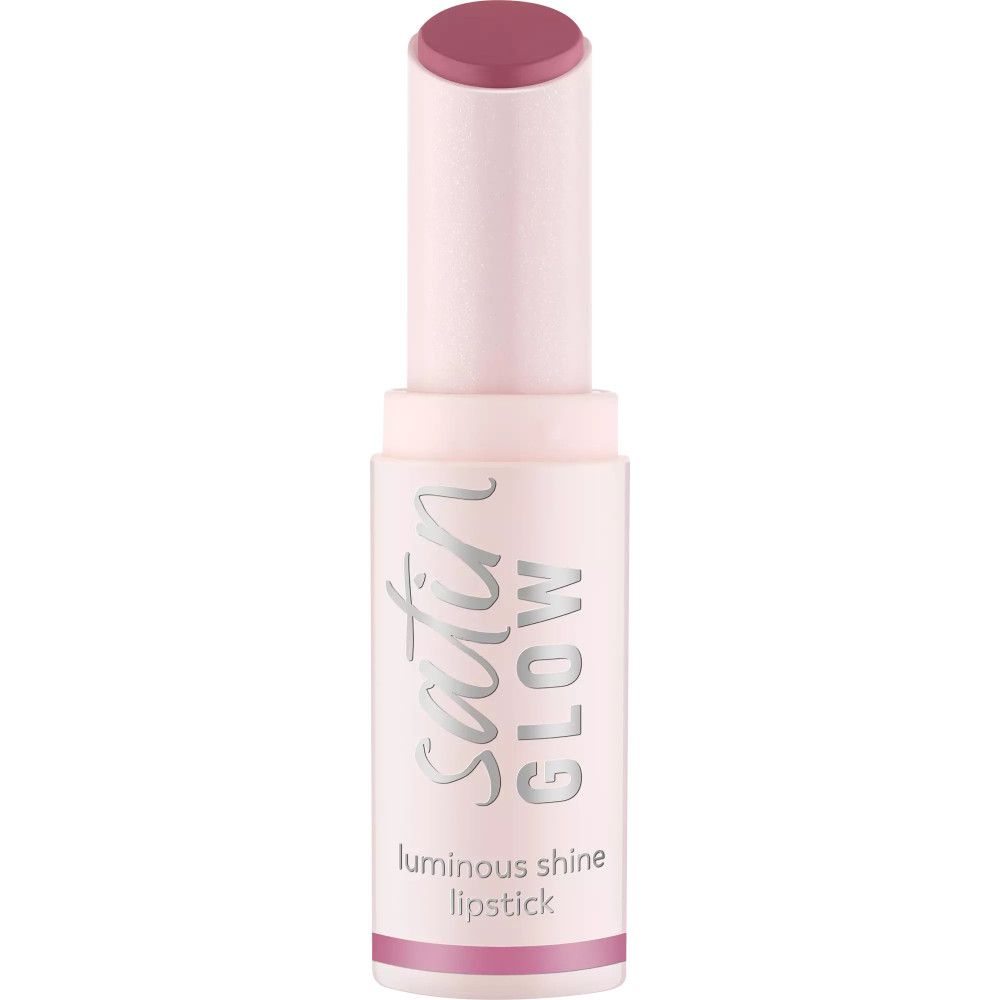 Lippenstift in rosa Hülse. Aufschrift: Satin Glow, luminous shine lipstick. Stiftende sichtbar.