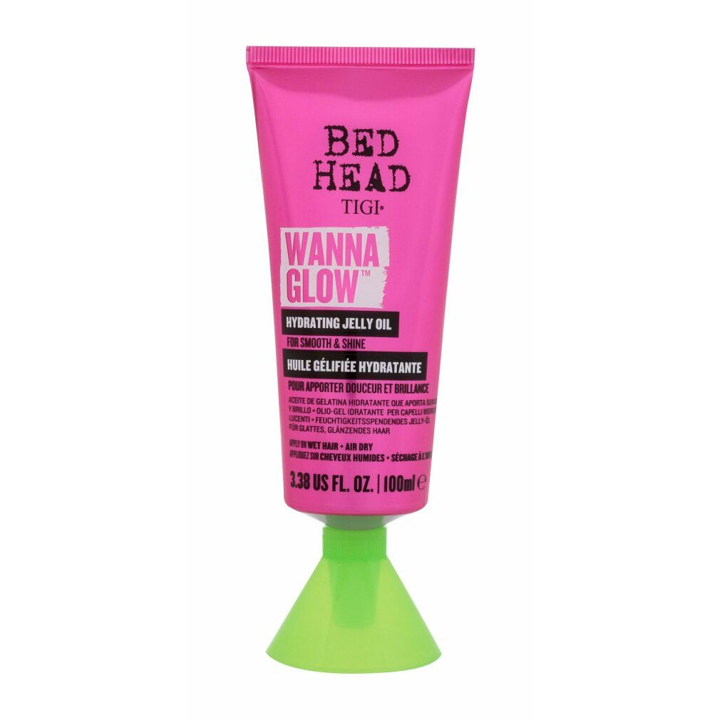 Rosa Tube mit grüner Basis. Bed Head Tigi Wanna Glow Hydrating Jelly Oil. Text auf Englisch und Französisch.