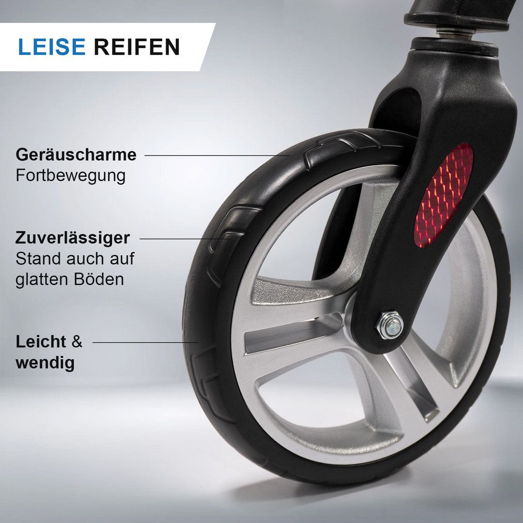 Nahaufnahme eines Rollator-Rades. Schwarzer Reifen, silberne Felge. Beschriftung: 'Leise Reifen'.
