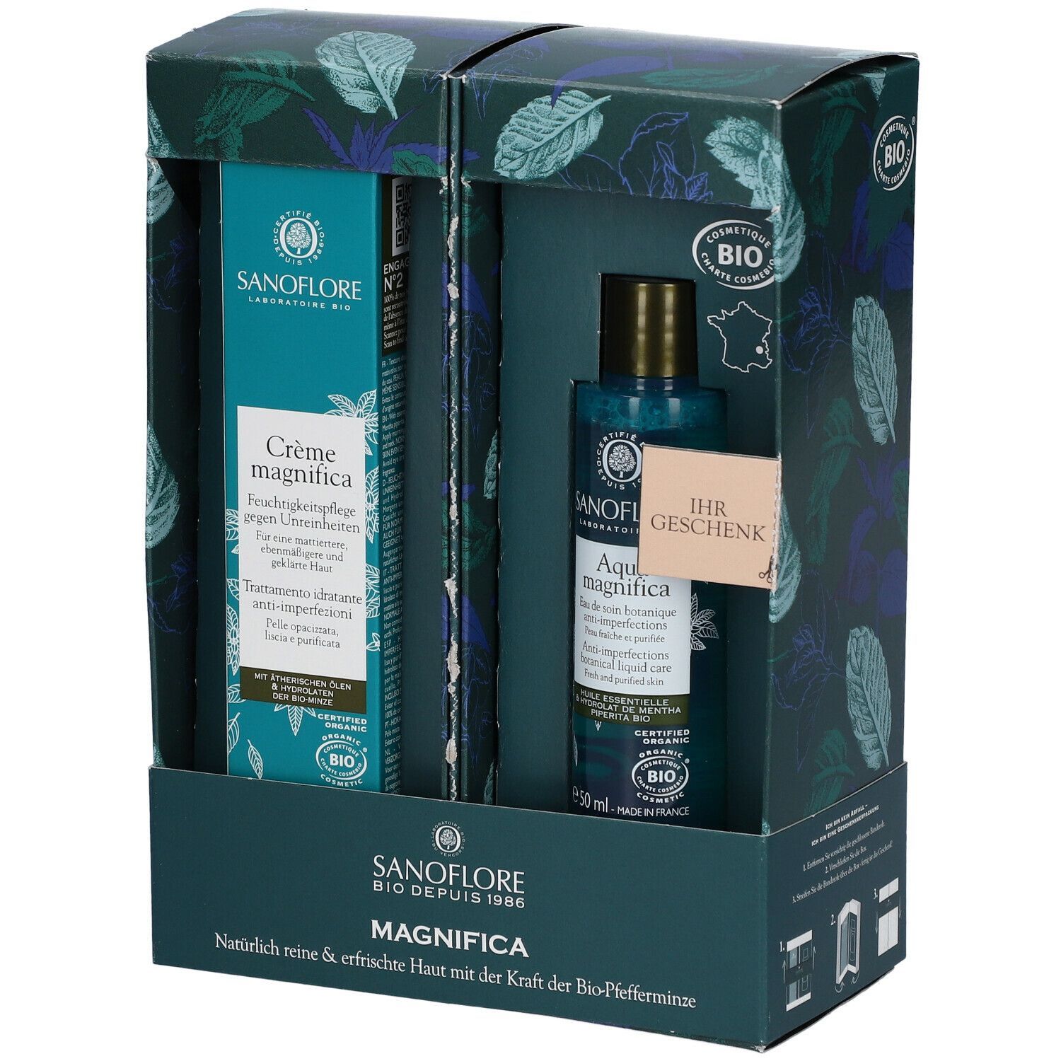Geschenkset mit Creme und Aqua Magnifica. Aufdrucke: Sanoflore, Bio-Siegel. Mit Geschenk-Etikett. Produkte in einer Schachtel.
