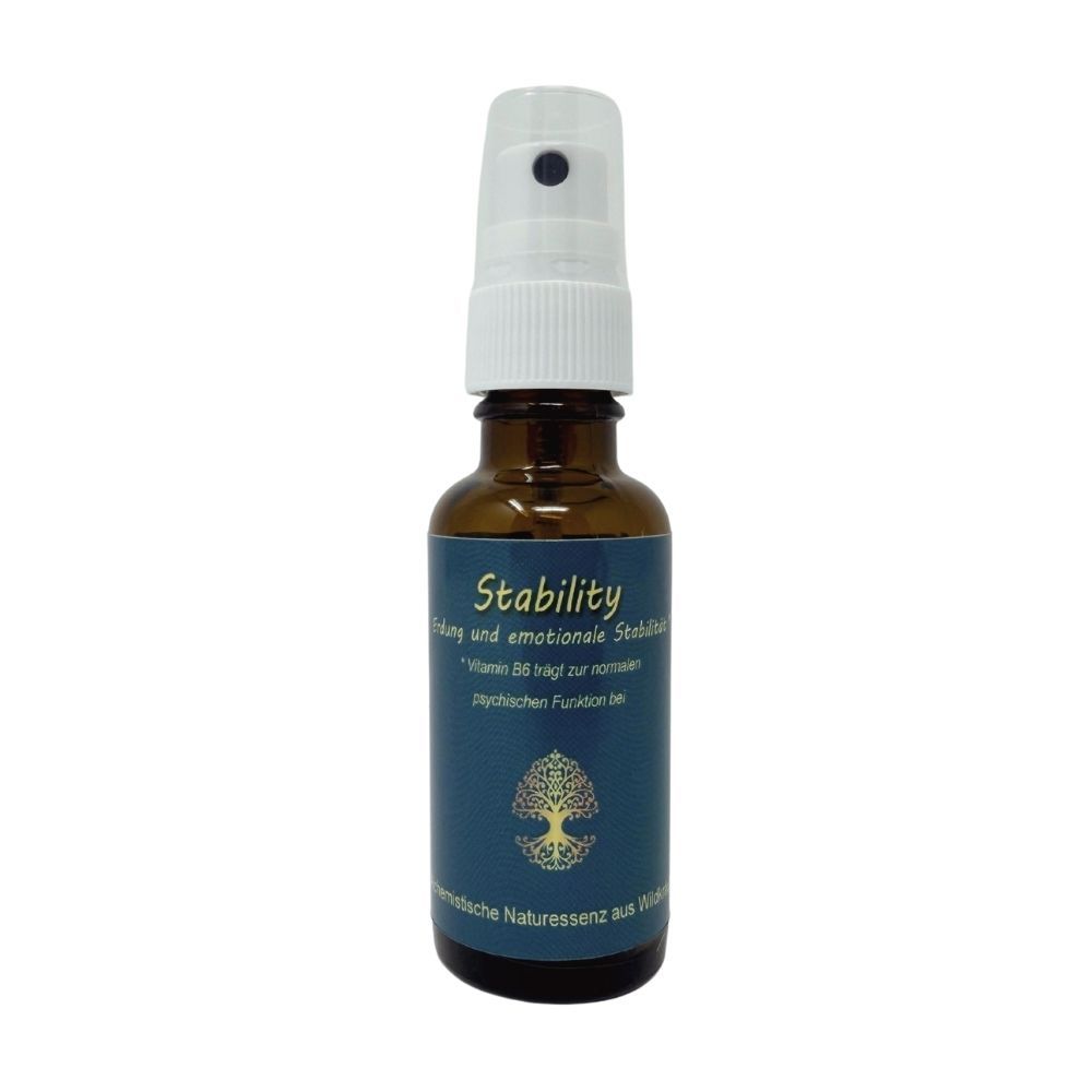 Braune Sprühflasche mit blauem Etikett, "Stability" und Lebensbaum-Symbol.