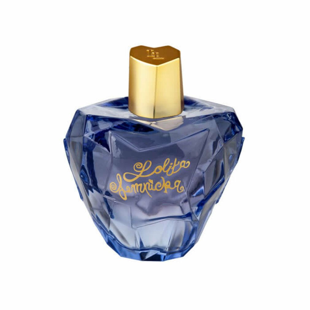 Blauer Parfümflakon mit goldenem Verschluss. Herzförmiger Flakon mit Schriftzug.