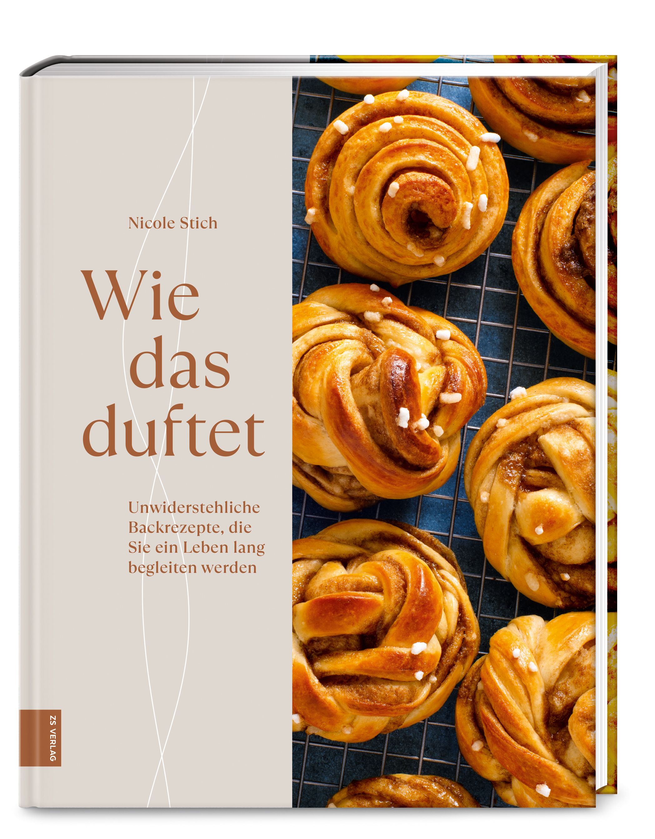 Buchcover mit dem Titel "Wie das duftet" von Nicole Stich. Gezeigt werden Zimtschnecken auf einem Gitter.