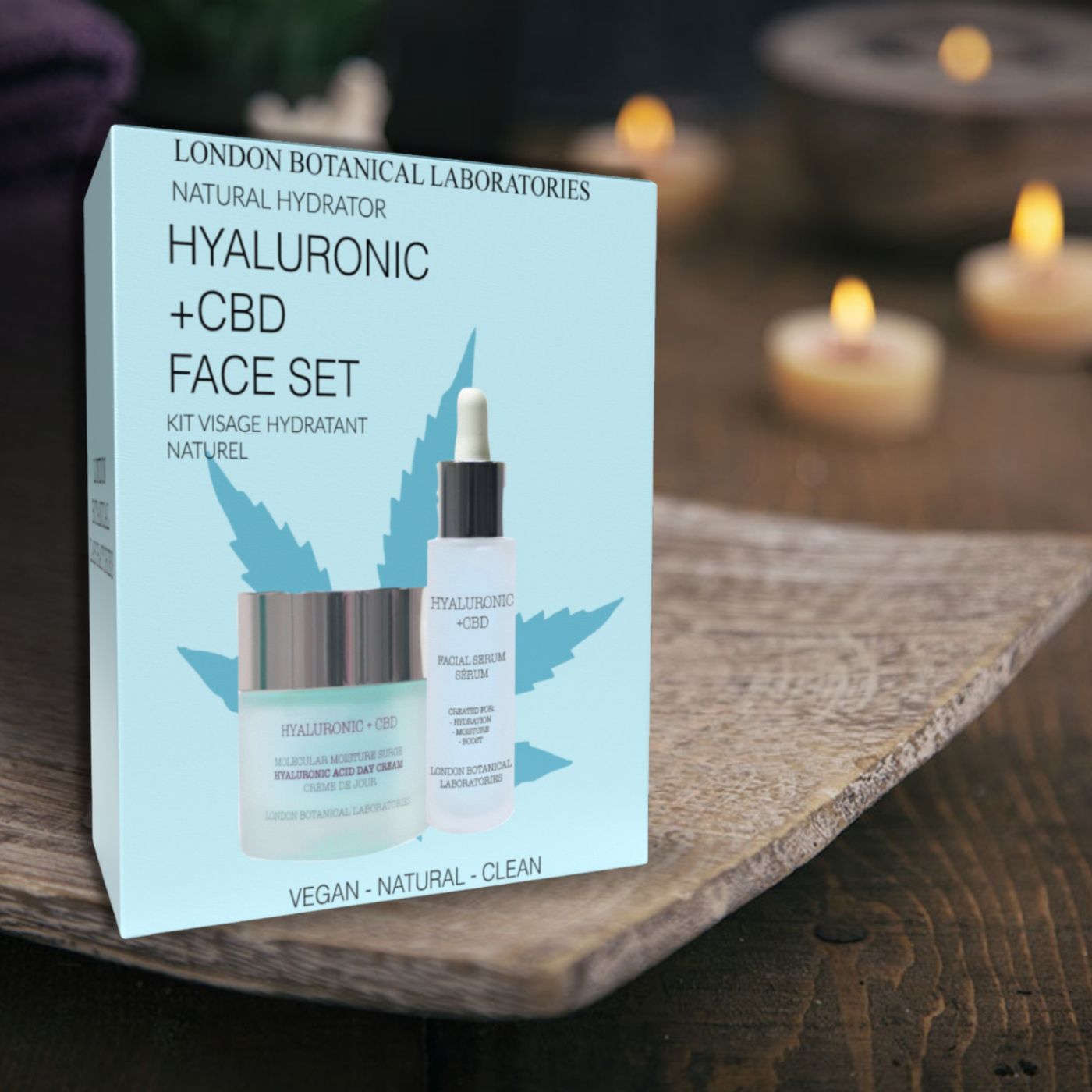 Geschenkset mit Creme und Serum. Hellblaue Verpackung mit Produktnamen und Hanfblatt-Design. Vegan, natürlich, sauber.