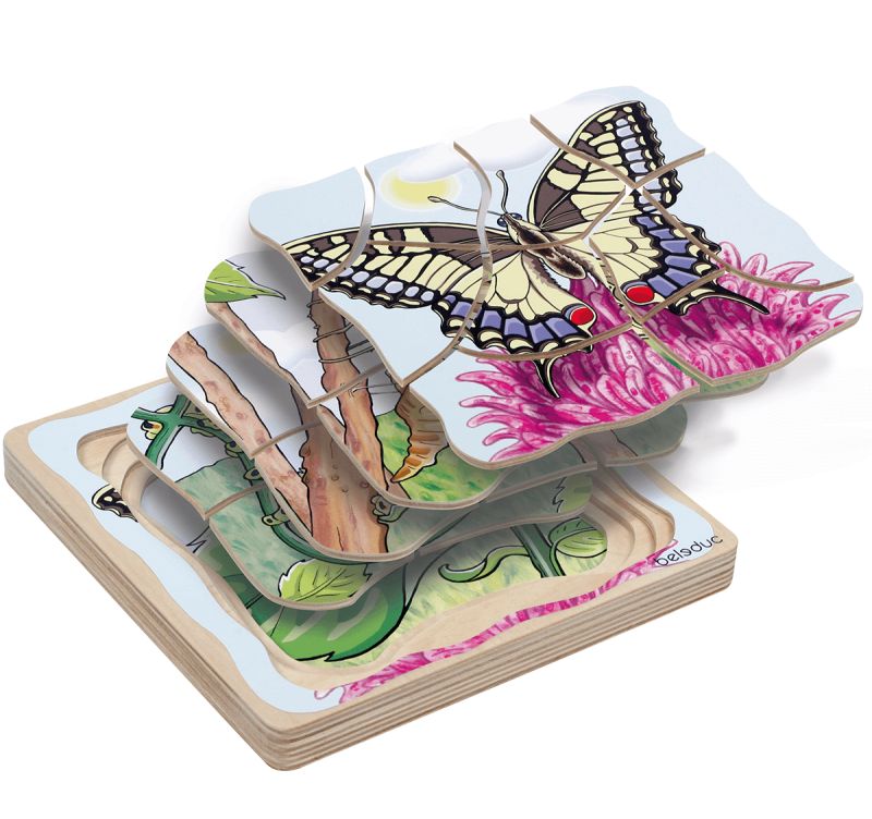Beleduc Lagen-Puzzle Schmetterling. Mehrere Puzzleteile gestapelt. Holzrahmen, Schmetterling auf Blume. Marke sichtbar.