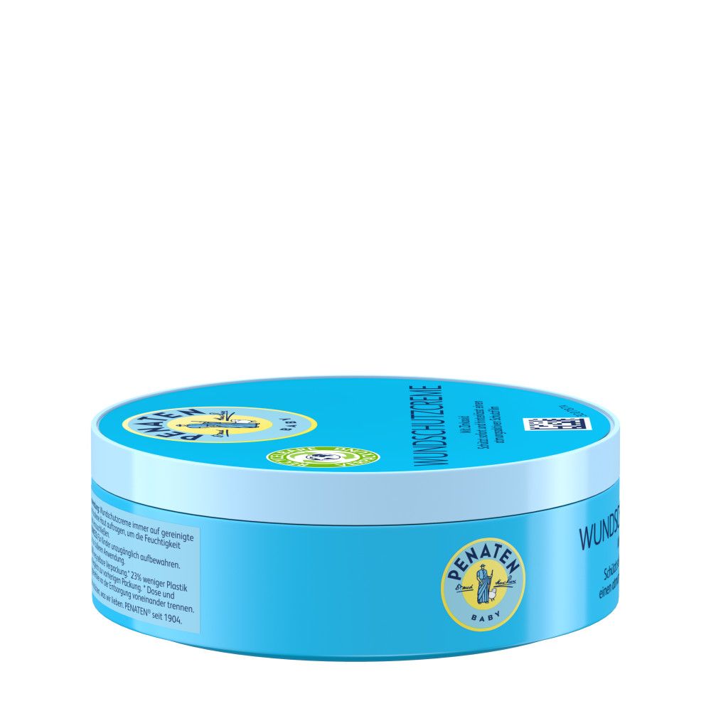 Blaue Dose mit gelbem Schriftzug "Wundschutzcreme". Marke Penaten. Text auf der Rückseite.