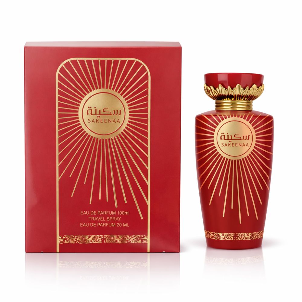 Rote Parfumflasche und Schachtel. Goldene Verzierungen und Schriftzug. Aufschrift: Sakeenaa. Eau de Parfum.
