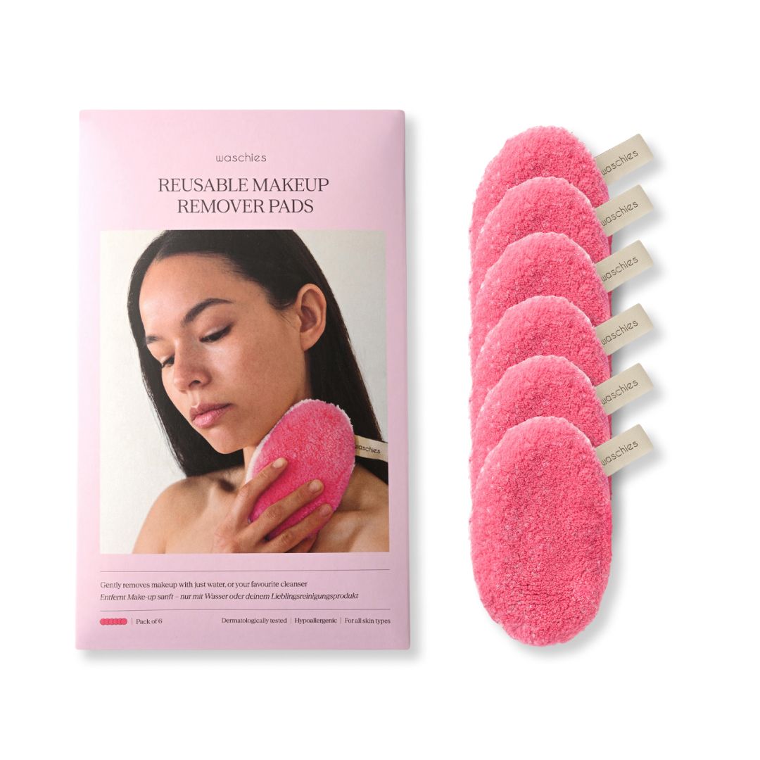 Rosa Abschminkpads mit Verpackung. Auf der Verpackung steht "waschies" und "REUSABLE MAKEUP REMOVER PADS".
