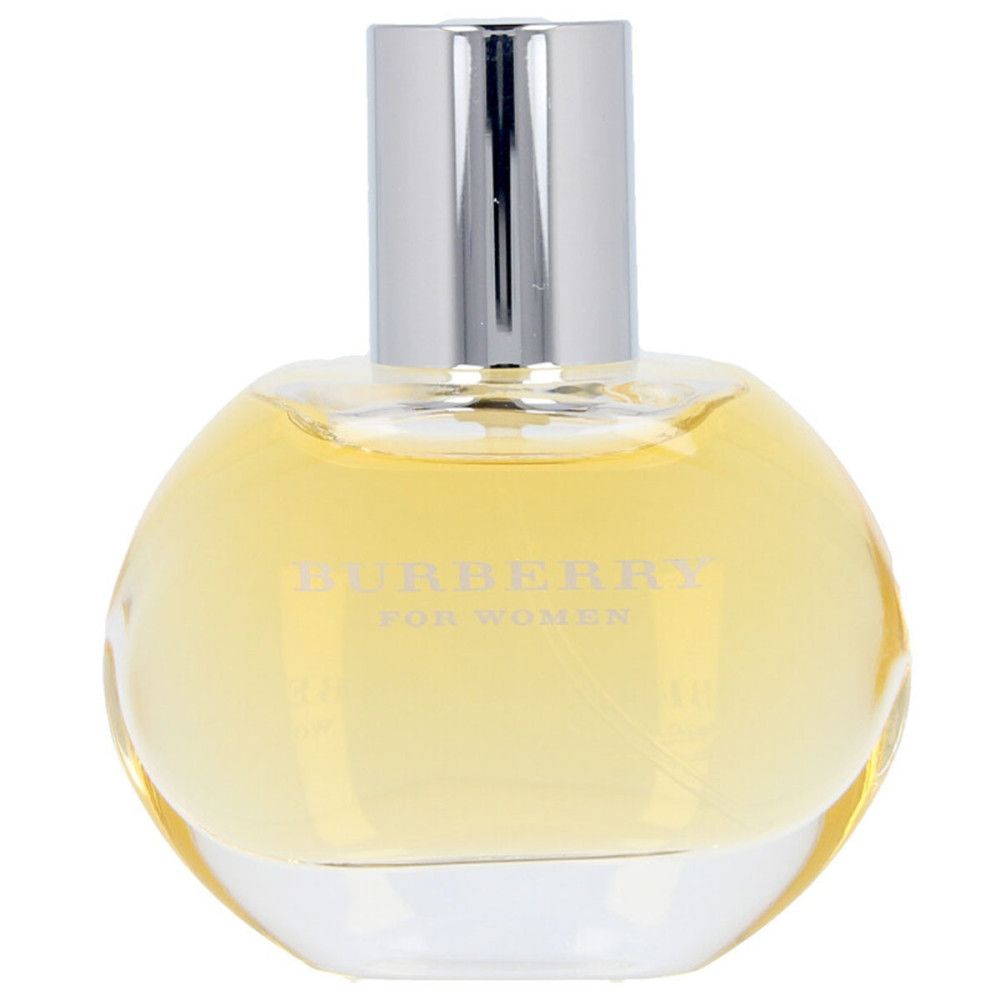 Runder Flakon mit silbernem Verschluss. Aufschrift: Burberry for Women. Gelbe Flüssigkeit sichtbar.