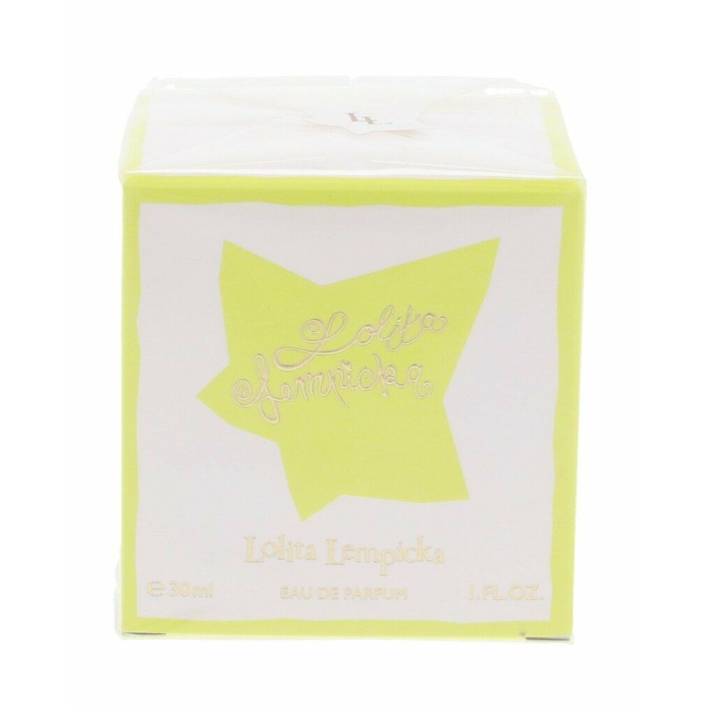 Karton mit Lolita Lempicka Eau de Parfum. Gelber Stern auf weißem Hintergrund. Schriftzug und grüne Umrandung.