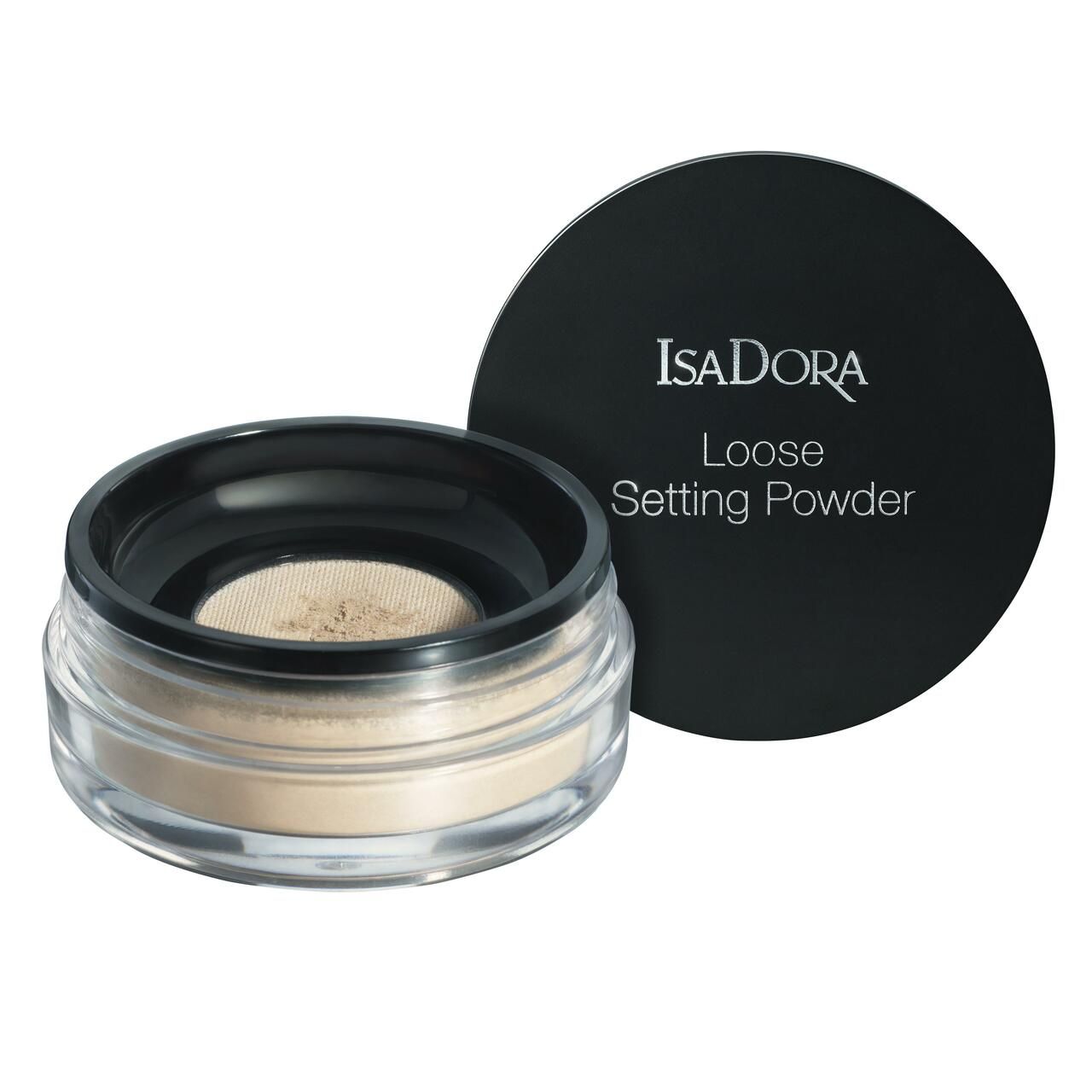 Offene Dose mit losem Puder. Schwarzer Deckel daneben. Aufschrift: IsaDora Loose Setting Powder. Helles Puder sichtbar.