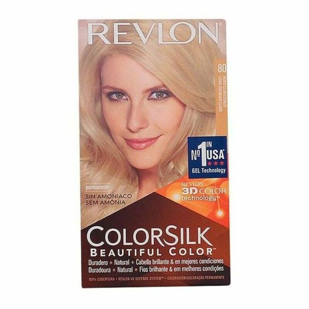 Haarfarbe-Packung. Marke Revlon, Produkt Colorsilk. Aufdruck: Light As Blonde. Frau mit blonden Haaren auf der Verpackung.