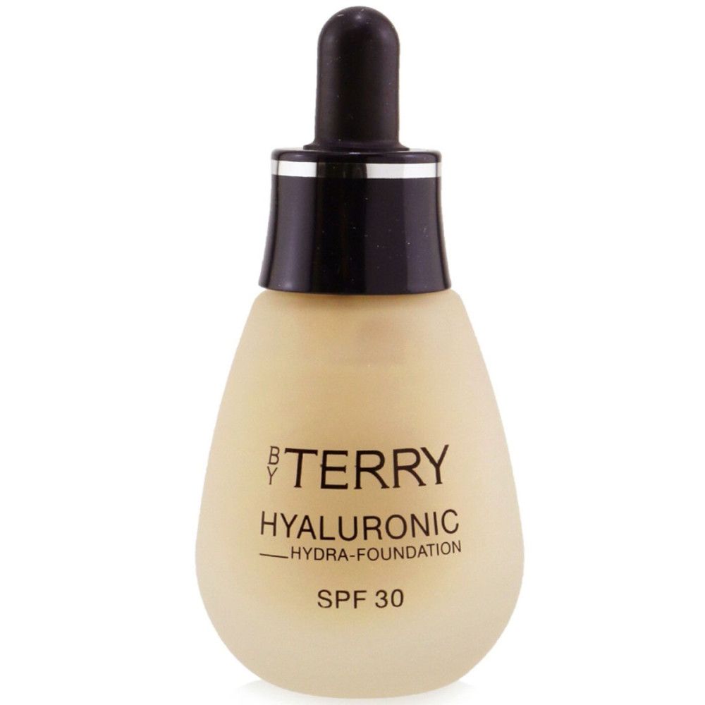 Foundation-Flasche. Aufschrift: BY TERRY, Hyaluronic Hydra-Foundation, SPF 30. Beige Farbton.