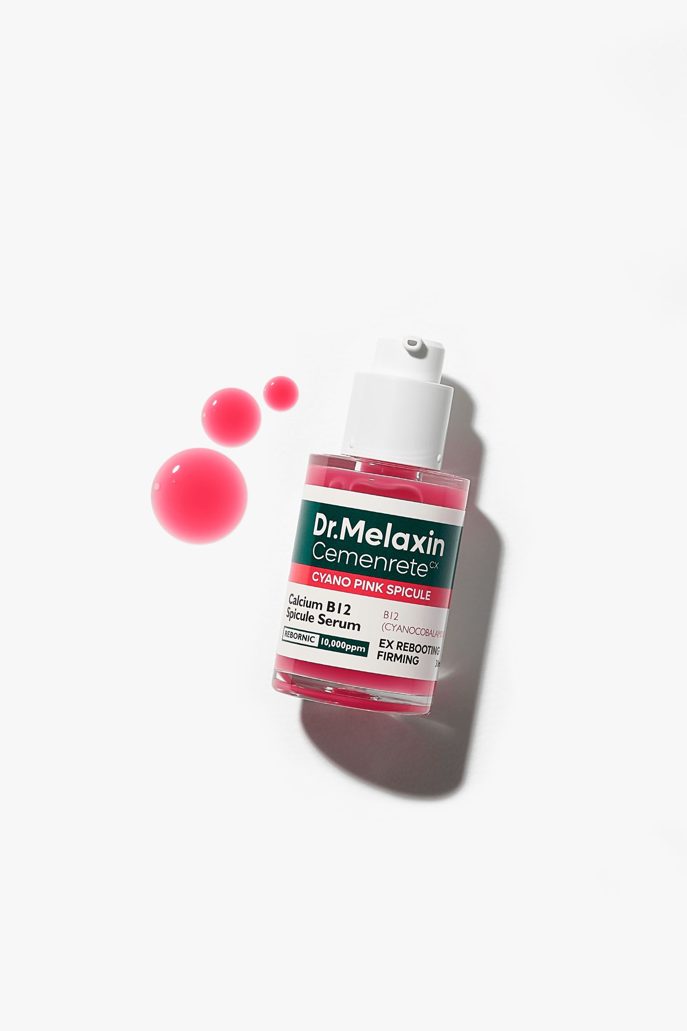Rosa Serumflasche mit rosa Tropfen. Aufschrift: Dr.Melaxin Cemenrete Cyano Pink Spicule Serum.