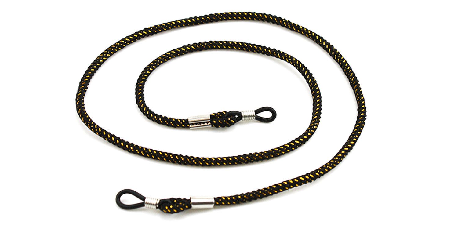 Brillenband, geflochten, schwarz-goldfarben. Mit Schlaufen zur Befestigung an Brillenbügeln. Metall-Details.