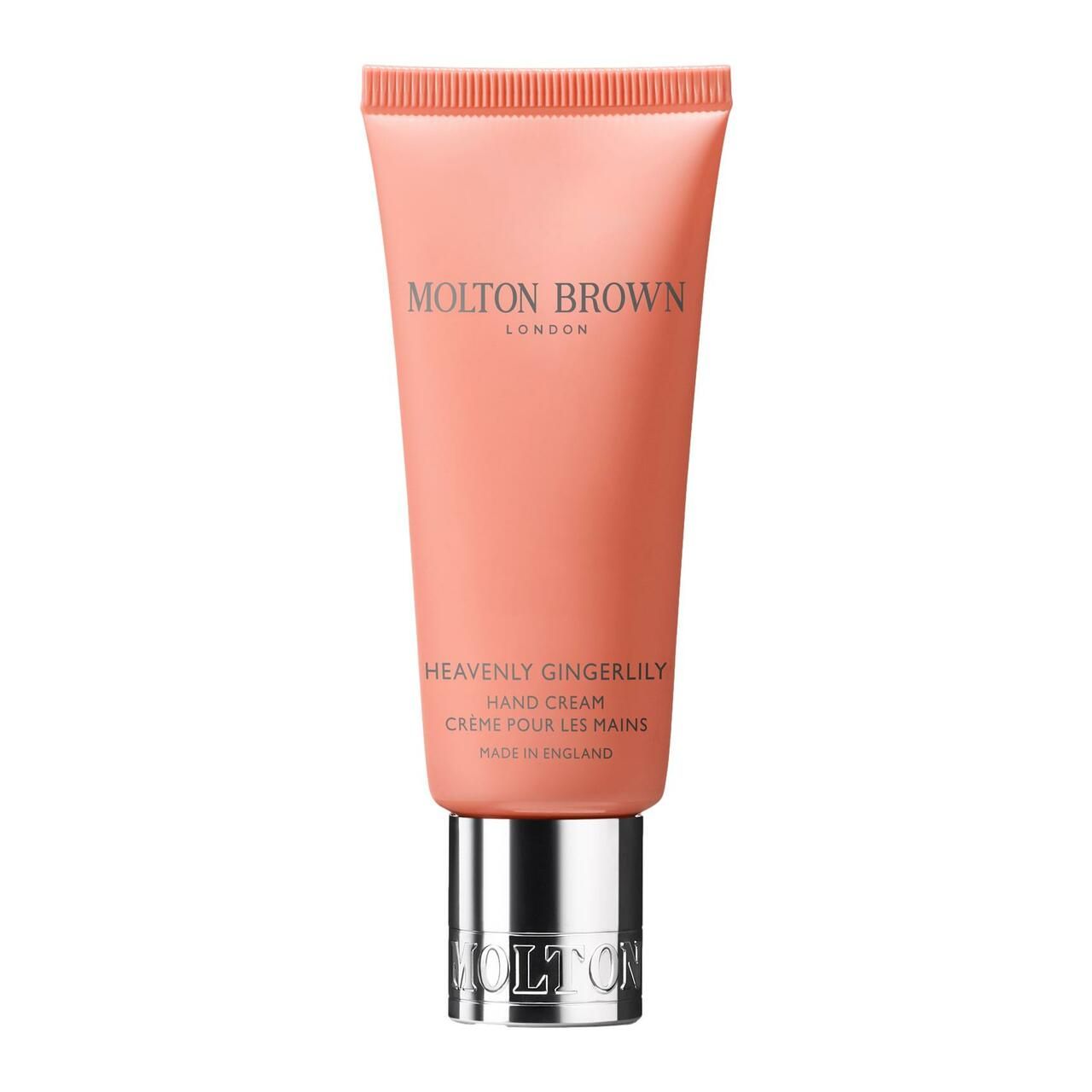 Rosa Tube mit silberner Kappe. Aufschrift: Molton Brown, Heavenly Gingerlily Hand Creme.