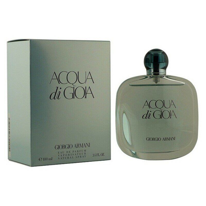 Flakon und Verpackung von ACQUA di GIOIA. Eckiger Flakon, dunkler Deckel. Aufschrift: ACQUA di GIOIA, GIORGIO ARMANI. Verpackung daneben.