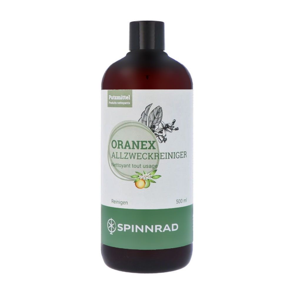 Braune Flasche mit weißem Etikett. Aufschrift: ORANEX Allzweckreiniger, SPINNRAD. Grün-weiße Verpackung.