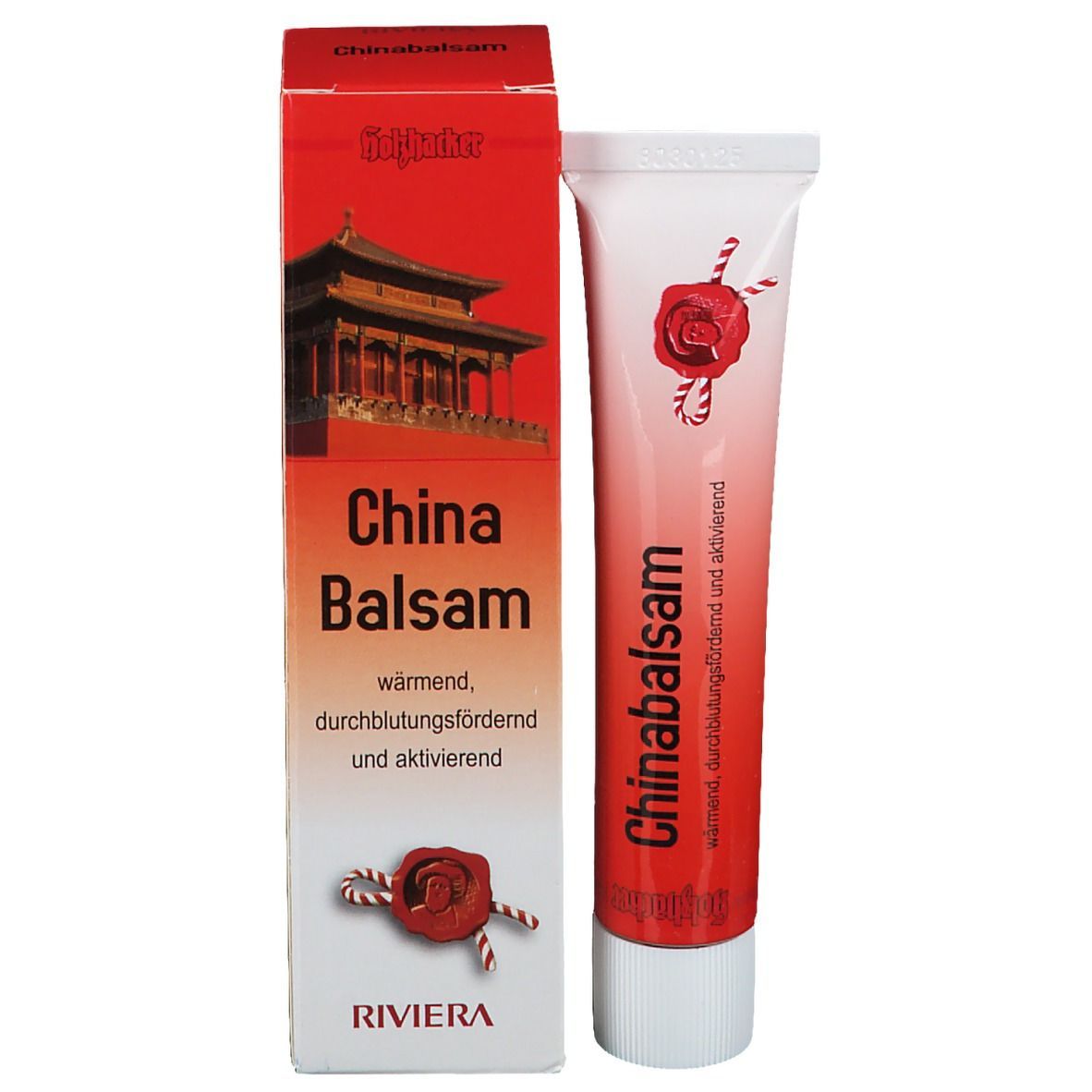 Chinabalsam-Tube und Schachtel. Rote Schachtel mit Bild, Produktname und Text. Tube mit Produktname.