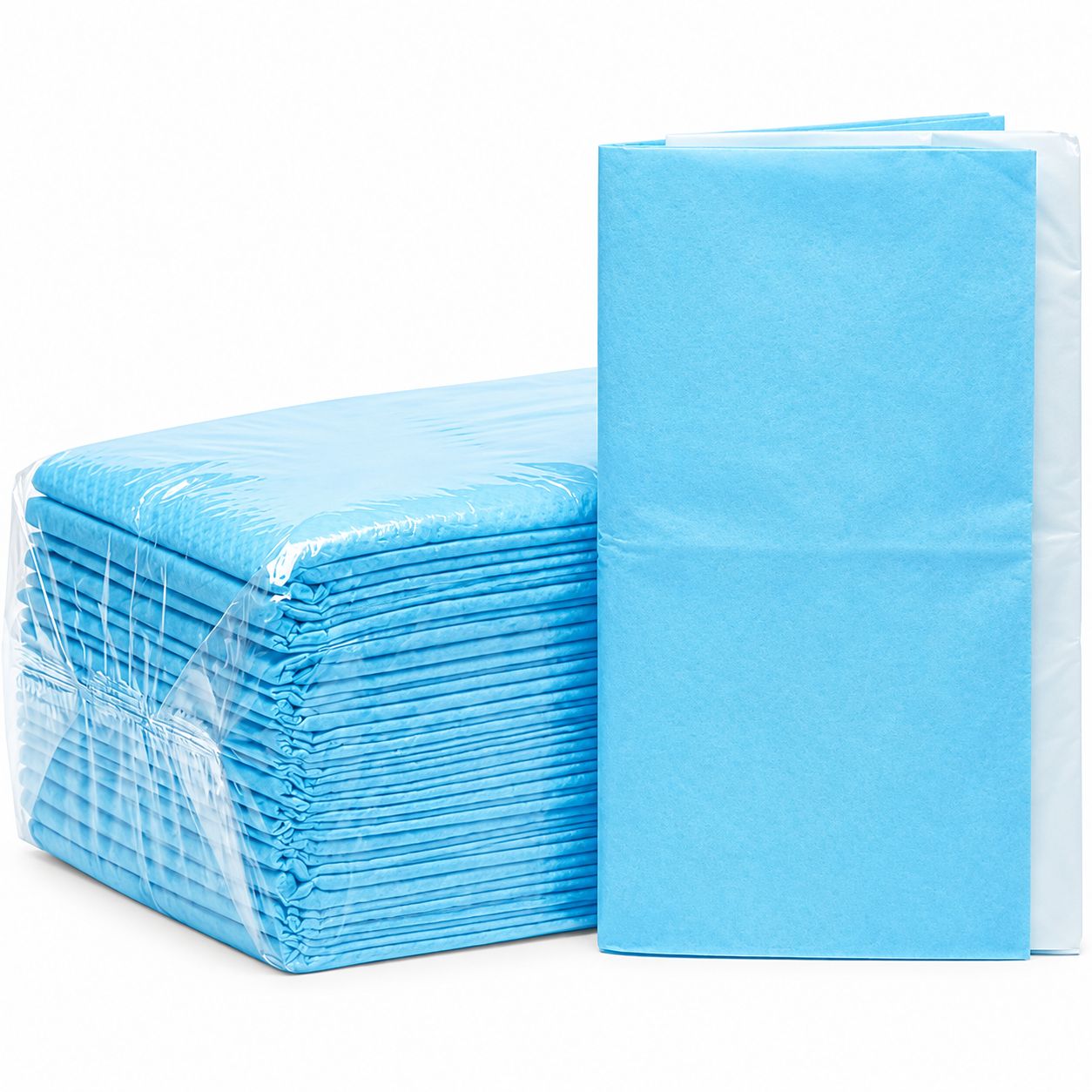 Stapel von blauen Einweg-Schutzlaken, einzeln verpackt.