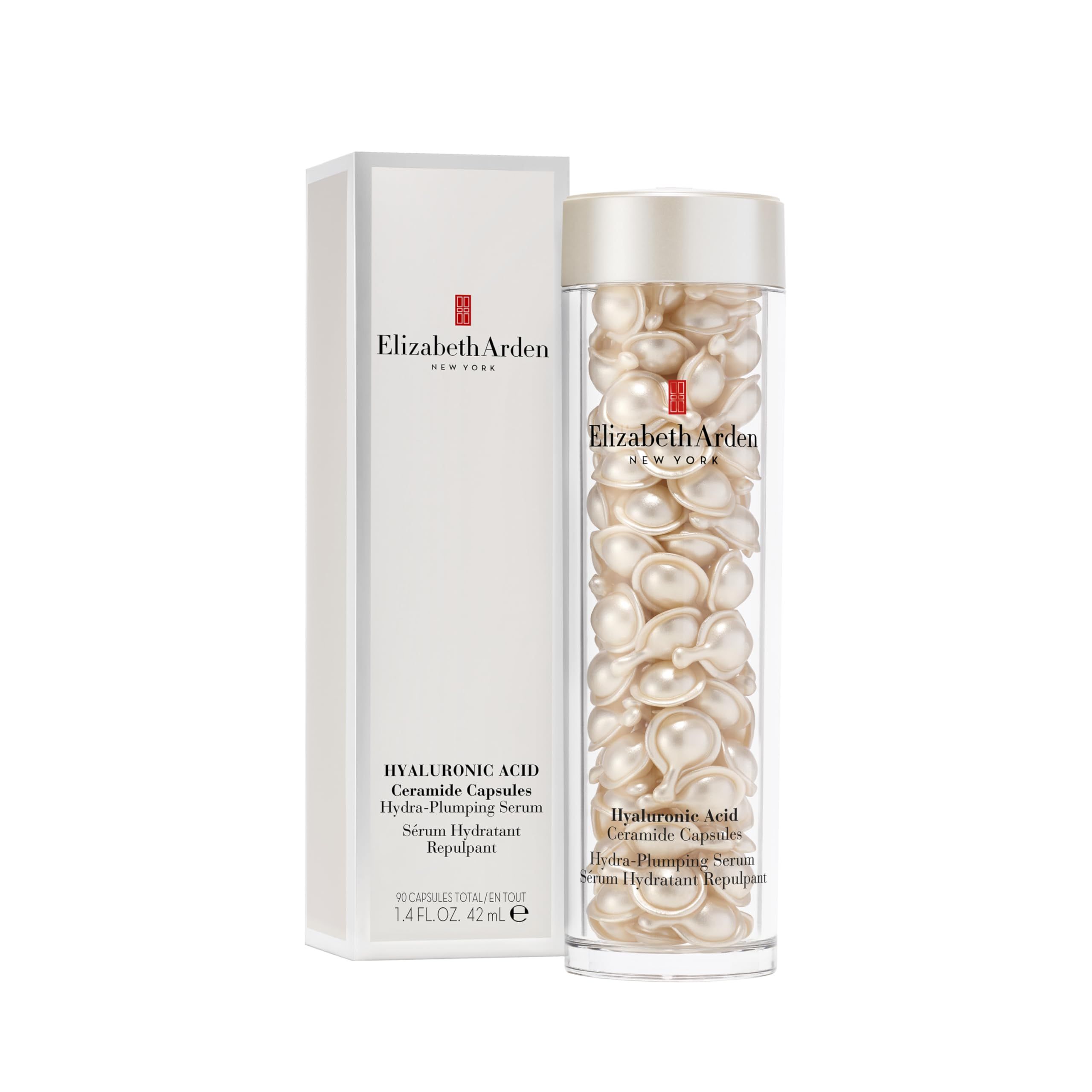 Transparente Flasche mit perlmuttfarbenen Kapseln und Karton. Text: Elizabeth Arden, Hyaluronsäure Ceramide Kapseln.