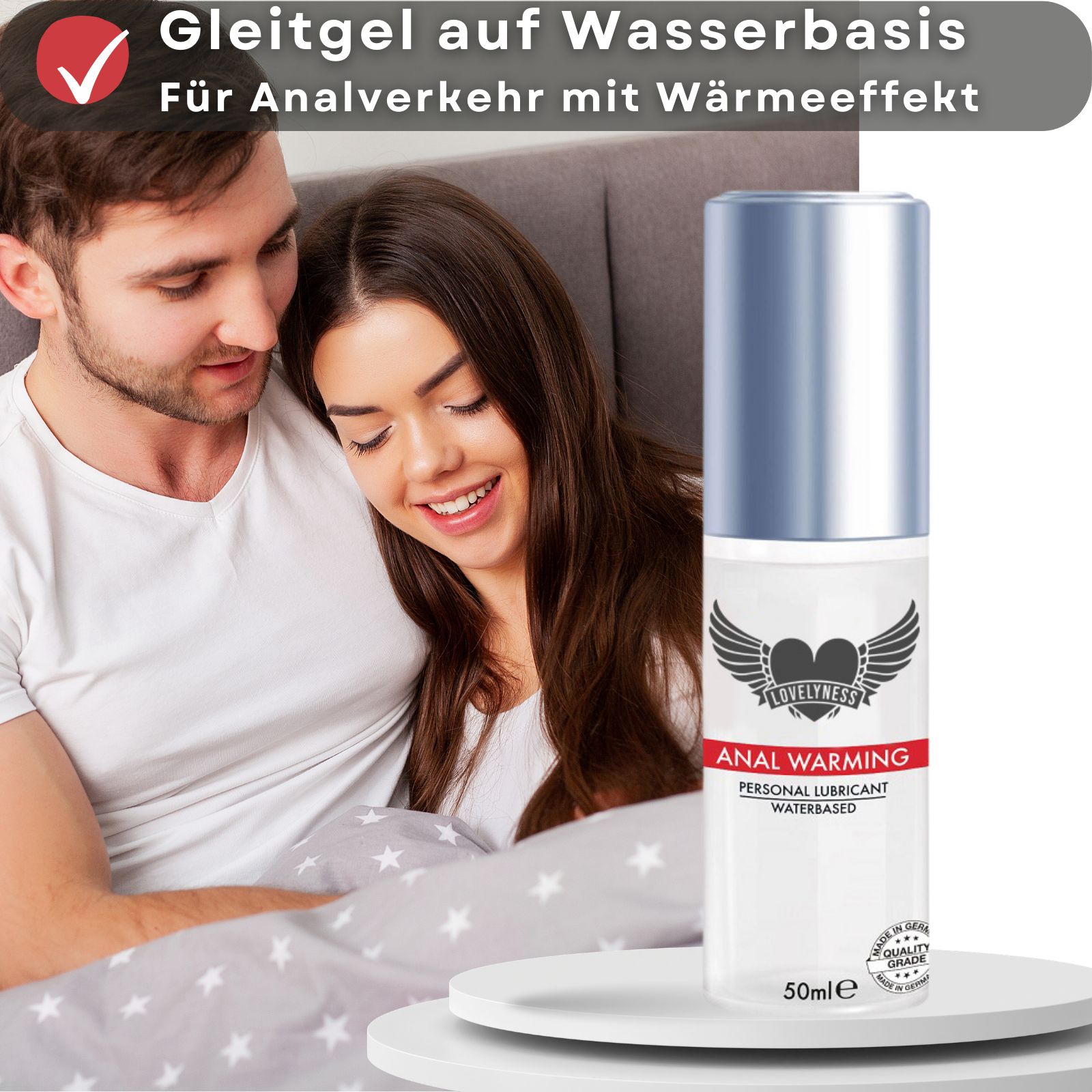 Gleitgel-Flasche. Text: Anal Warming, Personal Lubricant, Waterbased. Für empfindliche Haut. Hintergrund: Frau mit Blume.
