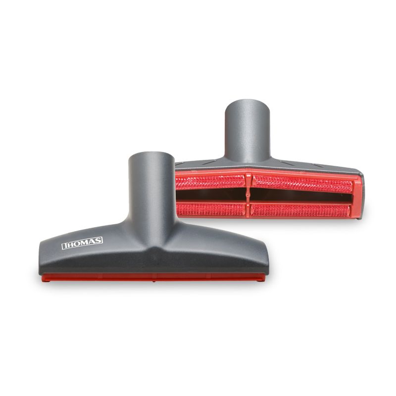 Zwei graue THOMAS Tierhaar-Polsterdüsen mit roten Borsten. Auf einer Düse ist der Markenname sichtbar.