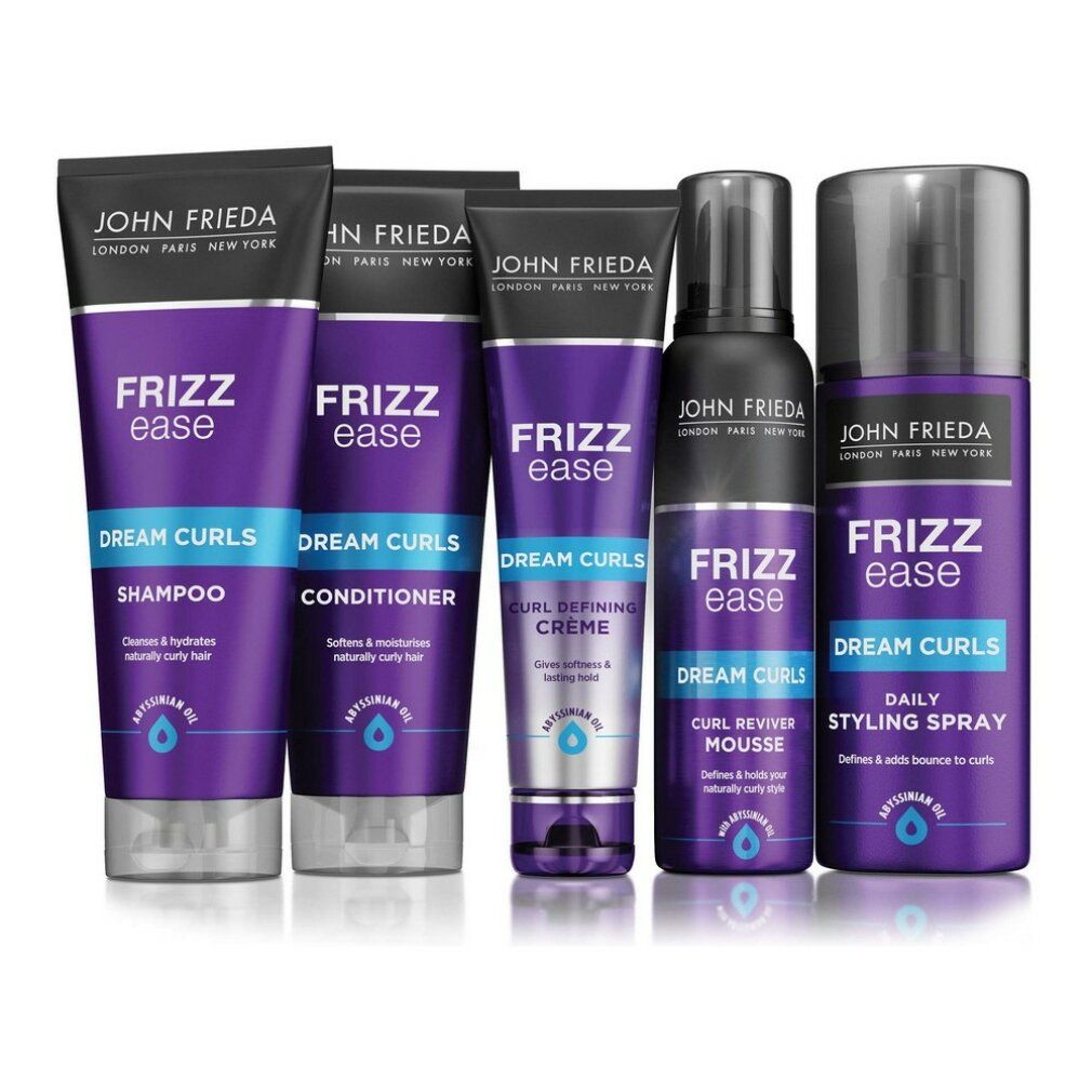 Fünf John Frieda Frizz Ease Produkte: Shampoo, Conditioner, Creme, Mousse, Styling Spray. Lila Tuben und Flaschen.