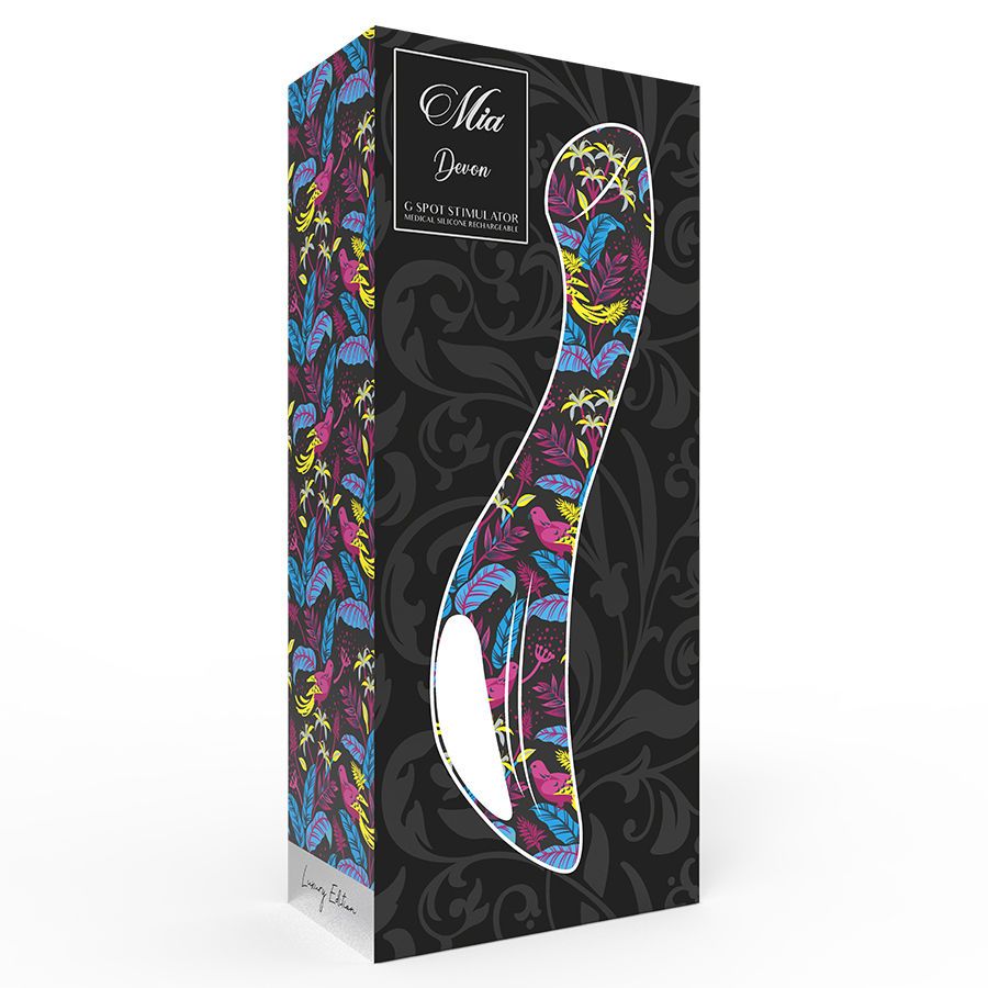 Verpackung für den Vibrator. Schwarzer Hintergrund mit floralem Muster. Produktname und Logo sichtbar.