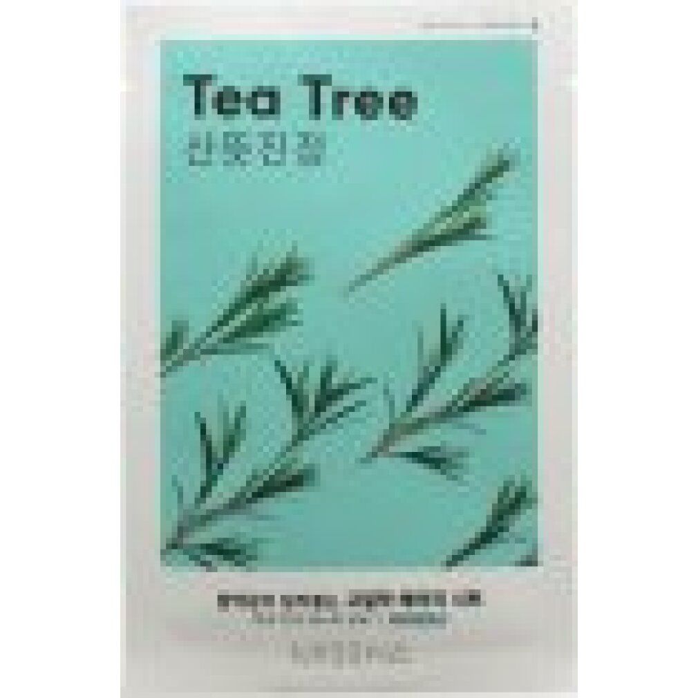 Verpackung mit grünem Hintergrund und Teebaum-Motiv. Text: Tea Tree, koreanische Schriftzeichen. Weiße Verpackung.