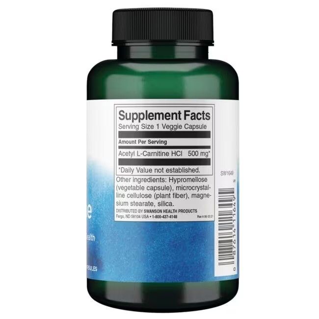 Rückseite einer grünen Flasche mit weißem Etikett. Enthält Nährwertangaben und Zutatenliste: Acetyl L-Carnitin HCl 500 mg.