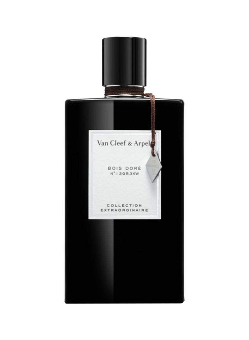 Schwarzer Flakon mit schwarzem Verschluss. Weißes Etikett mit Schriftzug: Van Cleef & Arpels, Bois Doré, Collection Extraordinaire. Anhänger.